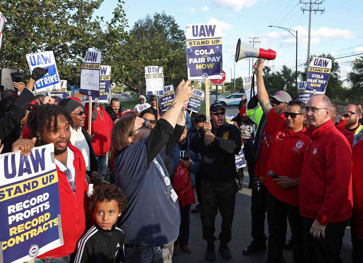 Ford, GM, Stellantis Lay Off 5,000 Workers; UAW 'Stand-Up Strike' May Be  Minimizing Damage