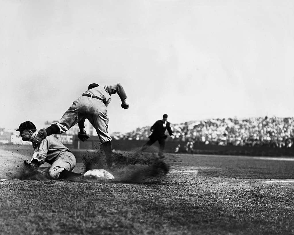 Ty Cobb sliding into third base. Ty Cobb sliding into third base.