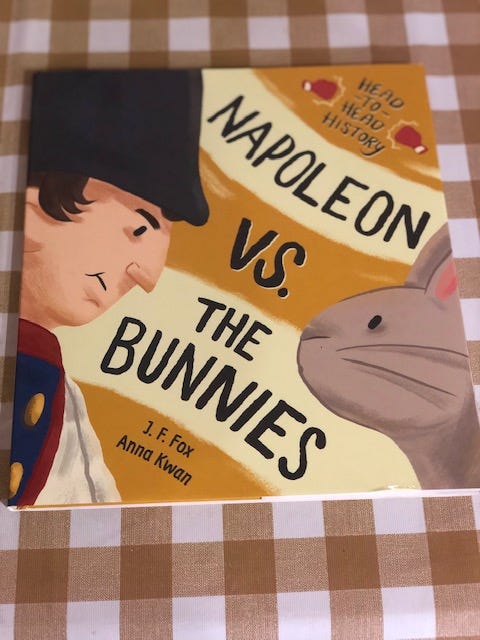 A children's book called Napoleon vs the Bunnies is pictured.