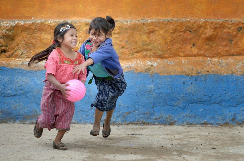 Girls play basketball during a 2014 recess from school in Tuixcajchis, a small Mam-speaking Maya village in Comitancillo, Guatemala. Under "informed consent" rules that require prior approval, the photographer would have had to stop the girls from playing, have them identify their parents, explain the intricacies of "informed consent" and usage, get their signature, and then be able to photograph the girls. That's a process that's allegedly designed to assure that the girls are not depicted in an undignified manner. Photo by Paul Jeffrey. Girls play basketball during a 2014 recess from school in Tuixcajchis, a small Mam-speaking Maya village in Comitancillo, Guatemala. Under "informed consent" rules that require prior approval, the photographer would have had to stop the girls from playing, have them identify their parents, explain the intricacies of "informed consent" and usage, get their signature, and then be able to photograph the girls. That's a process that's allegedly designed to assure that the girls are not depicted in an undignified manner. Photo by Paul Jeffrey.