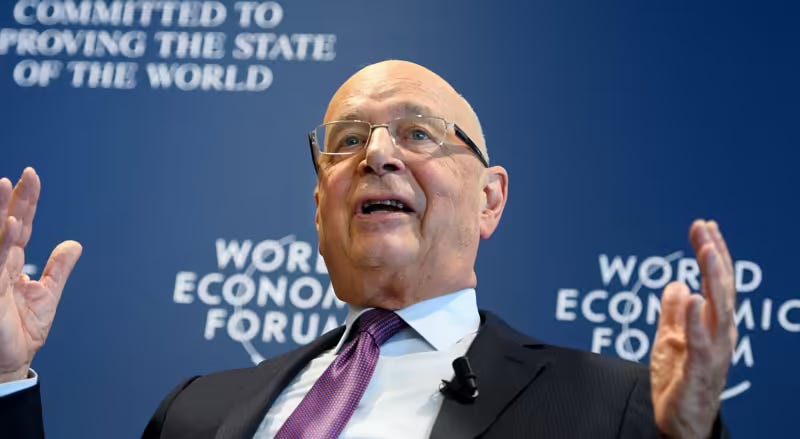 Klaus Schwab masyarakat tanpa uang tunai