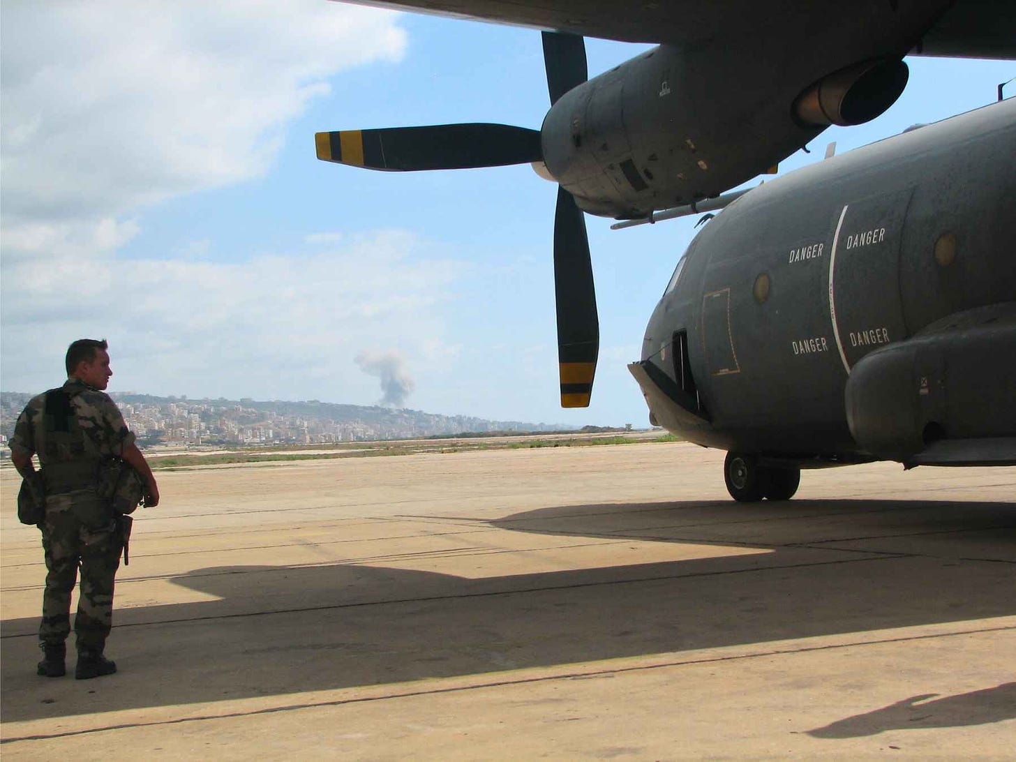 View of mushroom cloud from Beirut airport after disembarking from C-130. Photo by Constantine Markides