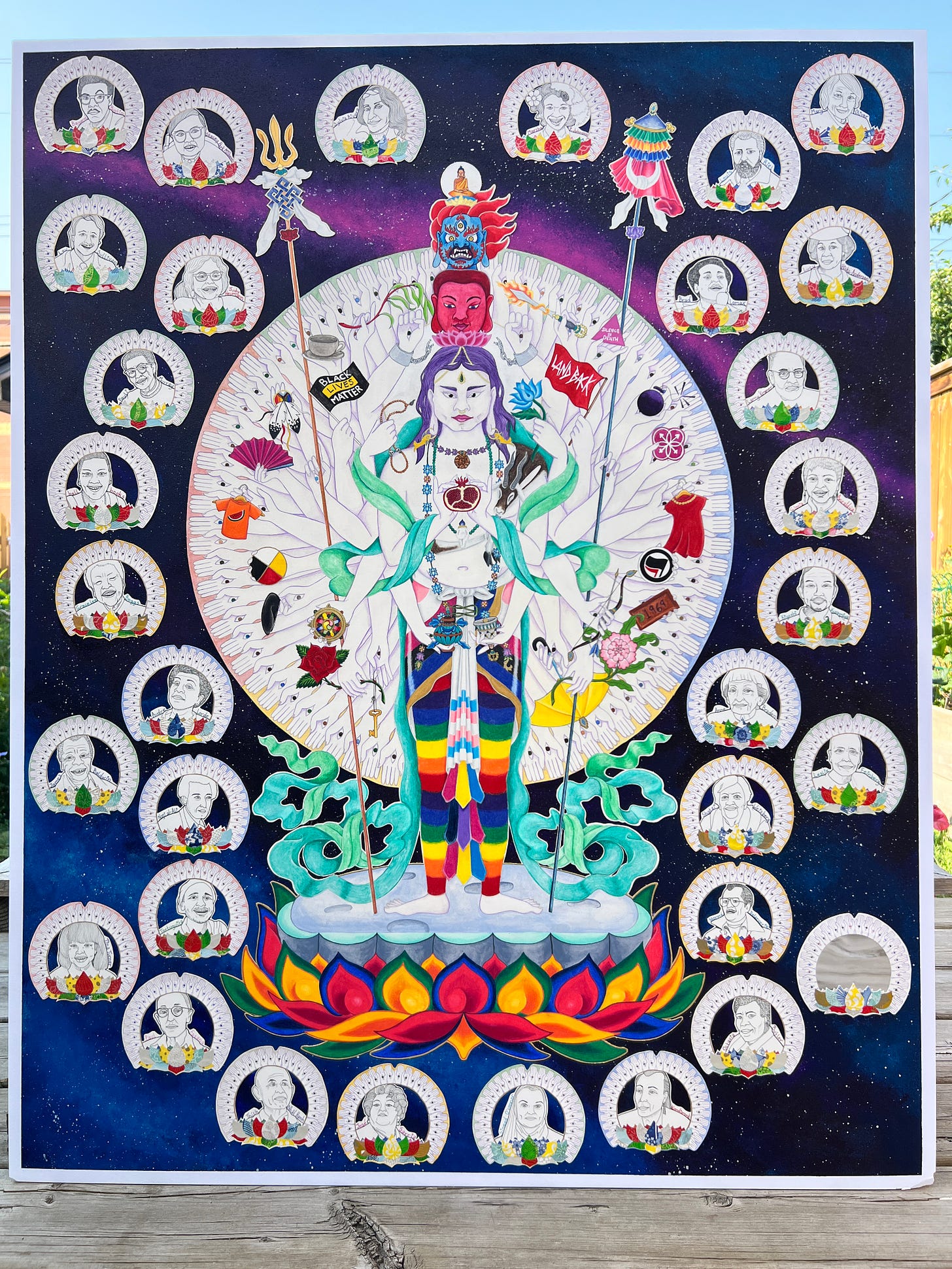 Contemporary image of the Thousand-Armed Avalokiteshvara in many vibrant colours, reasting in a galaxy, surrounded by ancestors. 