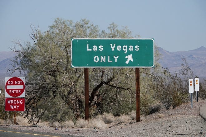 The drive from Los Angeles to Las Vegas is 290 miles and usually lasts four hours. The road consists of driving through the Mojave Desert, past Joshua trees, endless billboards, rest stops, abandoned buildings and some amazing scenery. Join us on a road trip through the desert to Las Vegas. Pictured: Road sign in Baker, California.