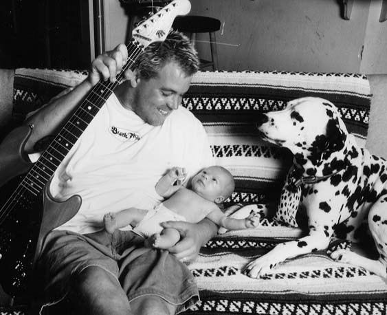 Former Sublime lead singer Bradley Nowell, who overdosed in 1996, is pictured with his son Jakob and his Dalmatian Louie, known as LouDog. His family started a foundation, opened a sober living home in Redlands and is hosting a sobriety festival on Saturday in Oceanside. Photo by Lisa Johnson