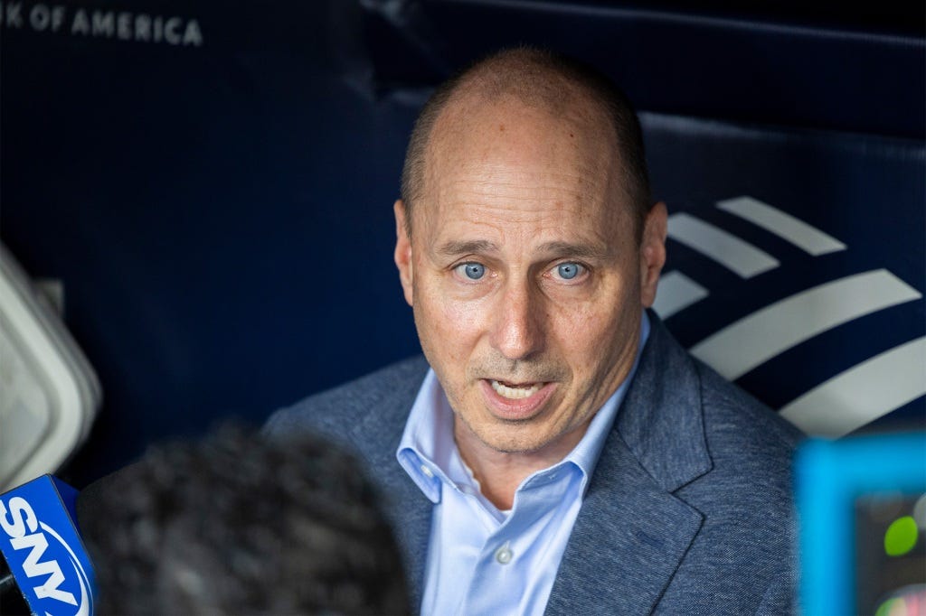 Yankees general manager Brian Cashman addresses reporters before a May 3 game.