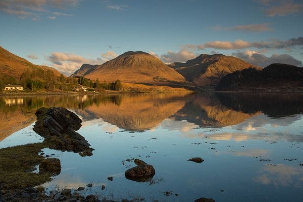 The Mountain reflected over Loch Long from Sallachy, Inverness Shire.