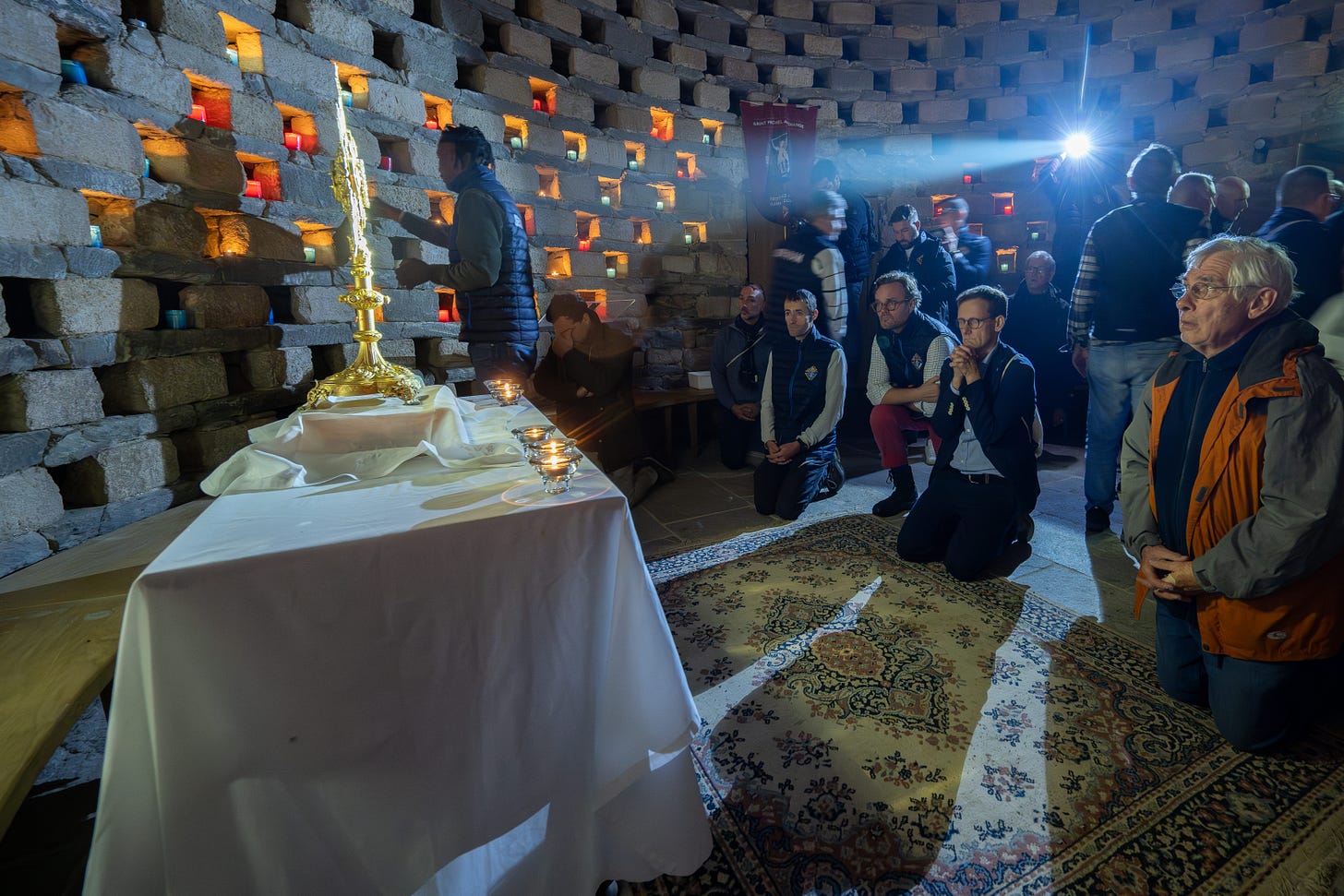 Knights pray together during the October pilgrimage weekend.