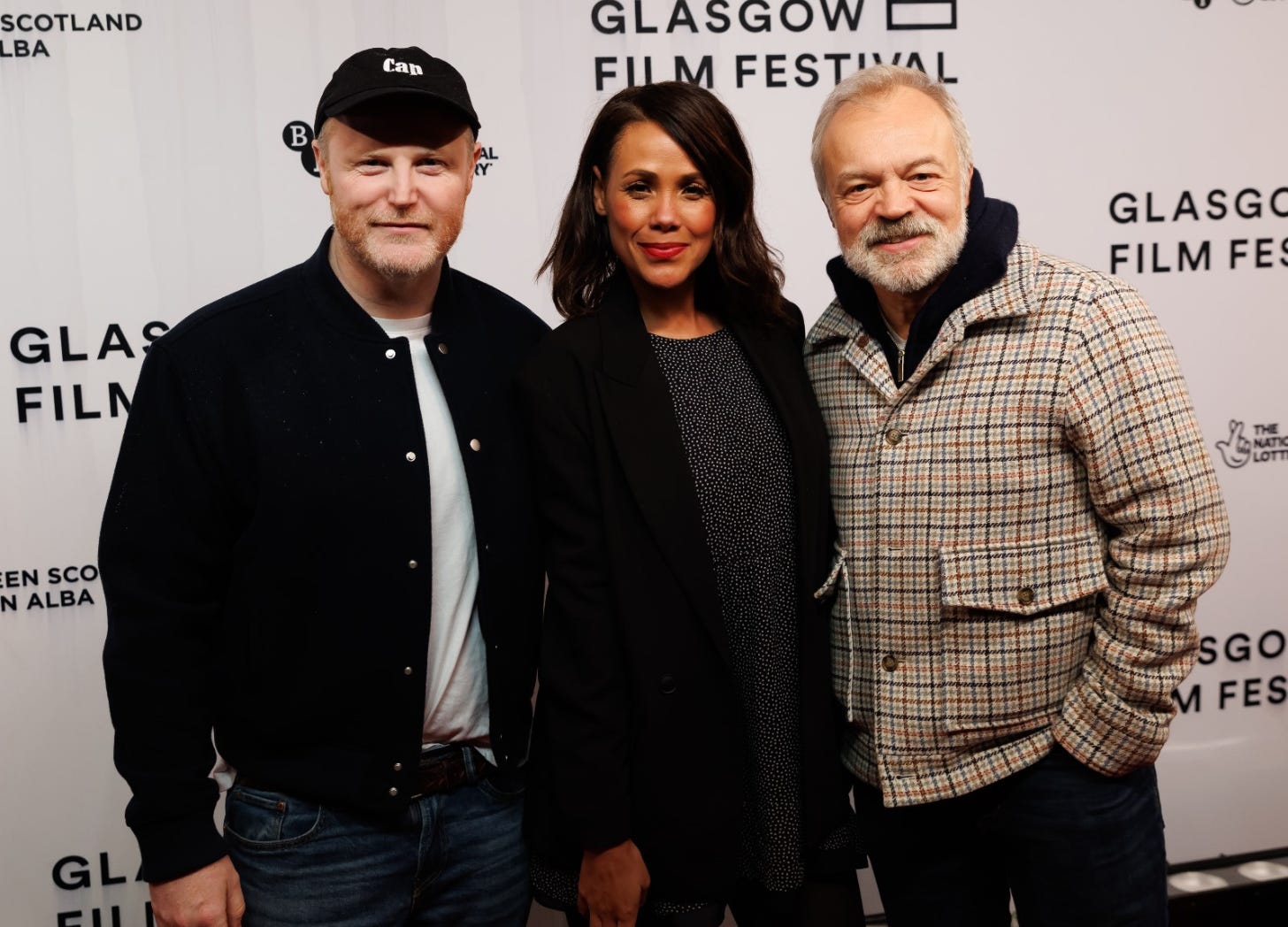 Gary Lamont, Jean Johannson and Graham Norton pose at Glasgow Film Festival.