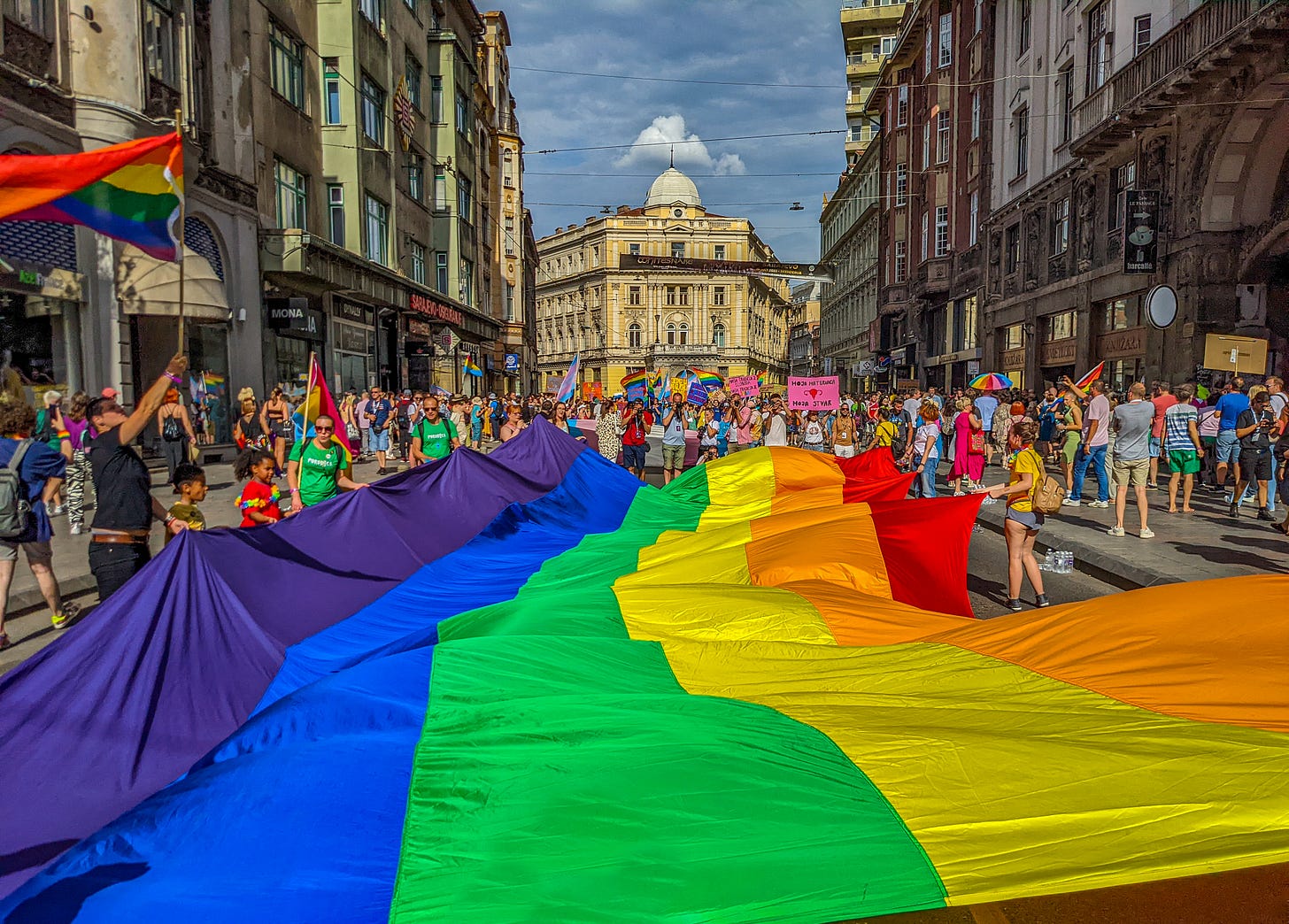 a giant rainbow flag at pride