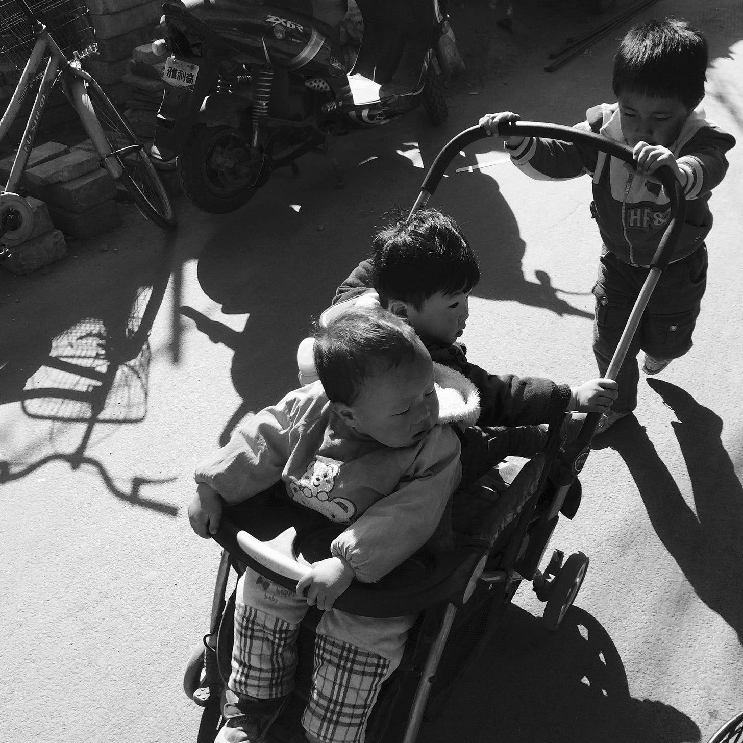Children playing in a Beijing hutong.
