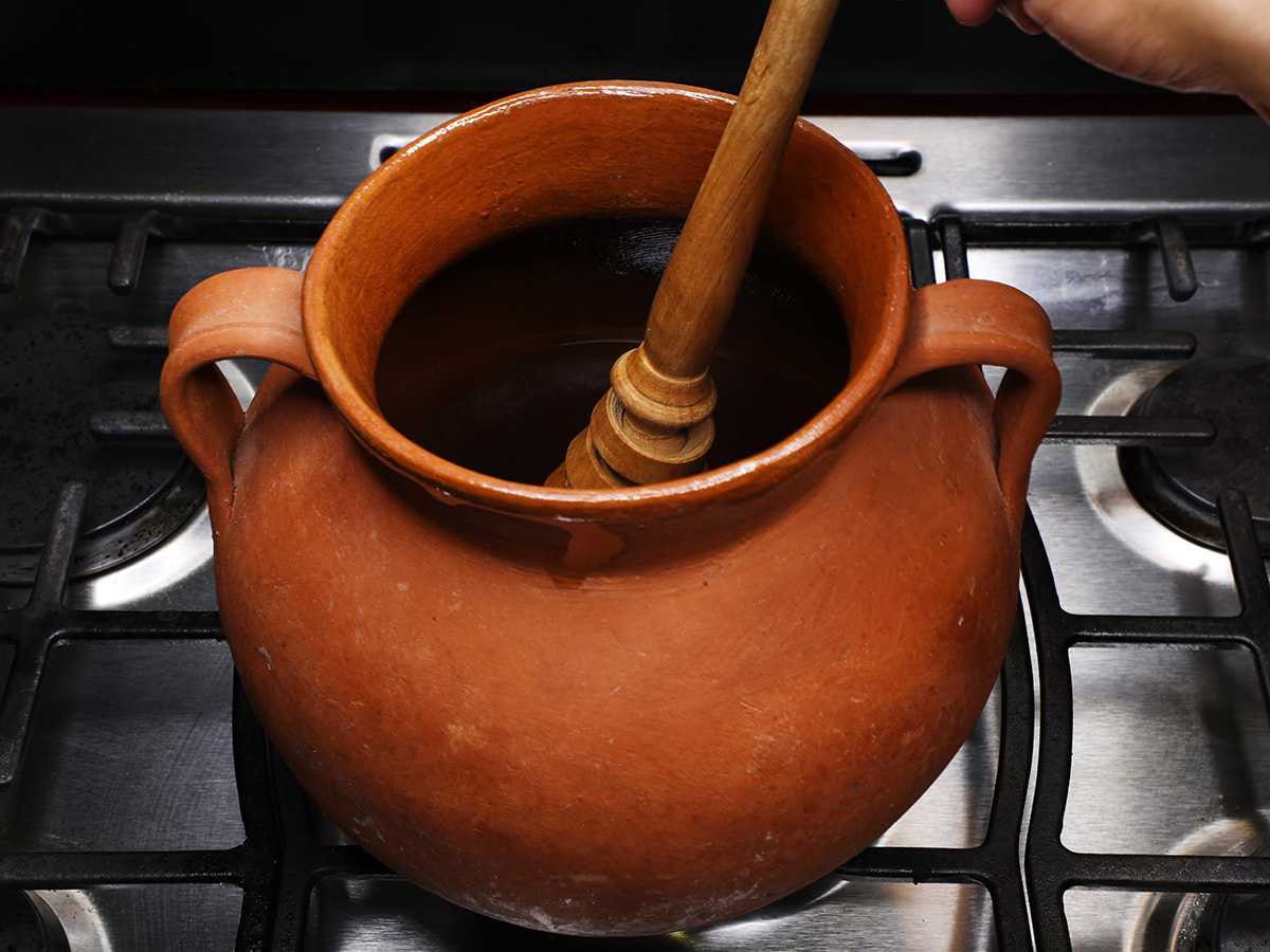 whisking piloncillo mixture