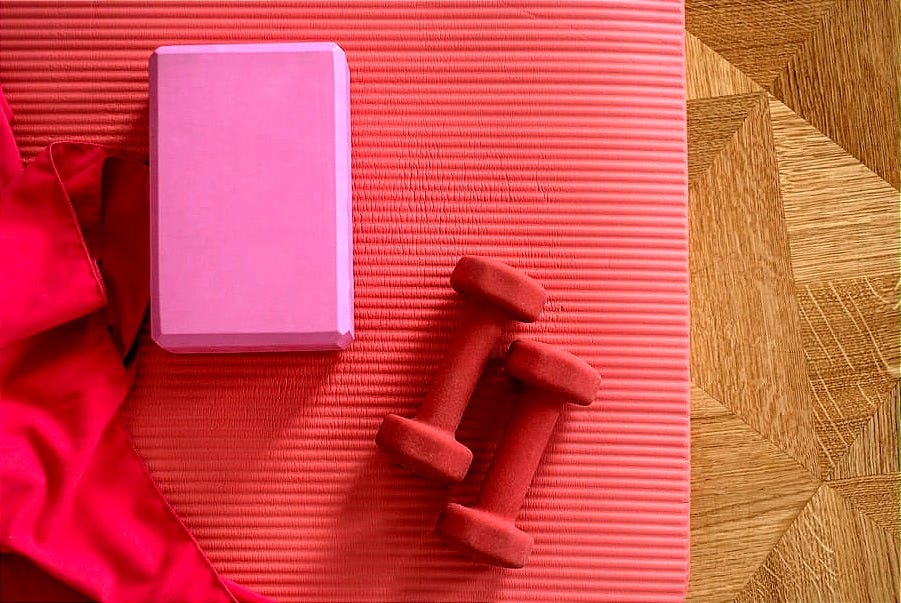 pink and gray rolling chair