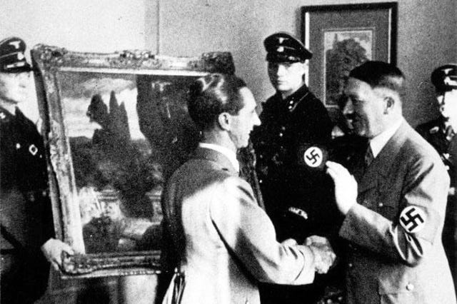 Hitler and Goebbels congratulating themselves on stolen Italian artwork.