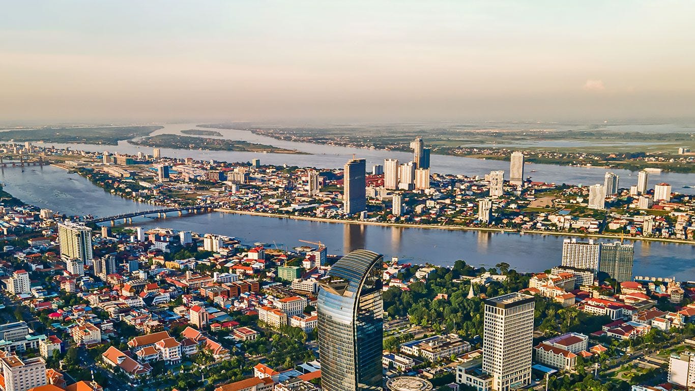 https://static.ips-cambodia.com/wp-content/uploads/2023/01/Phnom-Penh-skyline-IPS-Cambodia.jpg