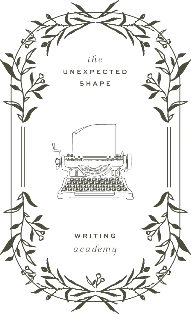the crest for The Unexpected Shape Writing Academy, which has a typpewriter and a floral border