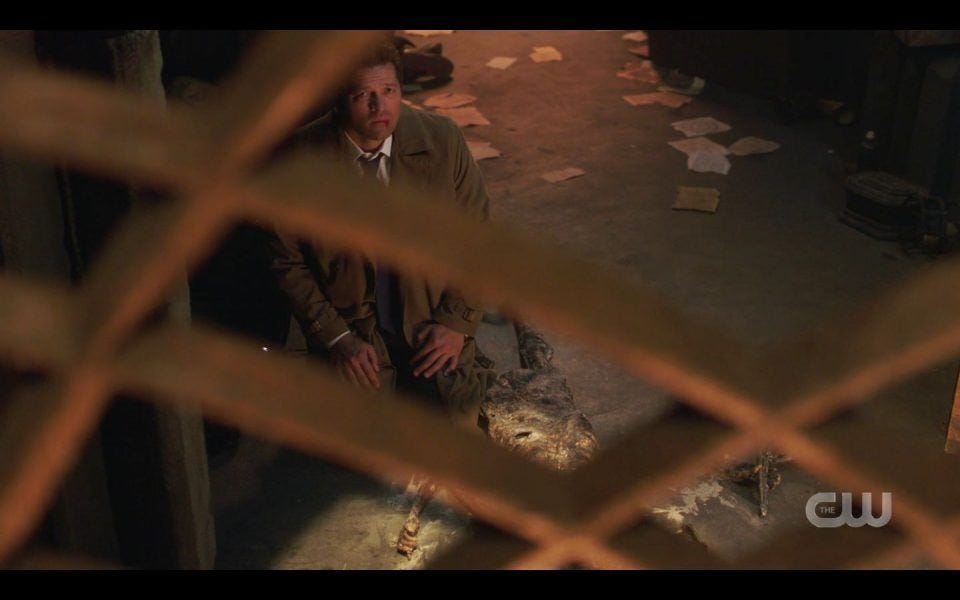 Castiel shattered looking up at bars SPN Rupture