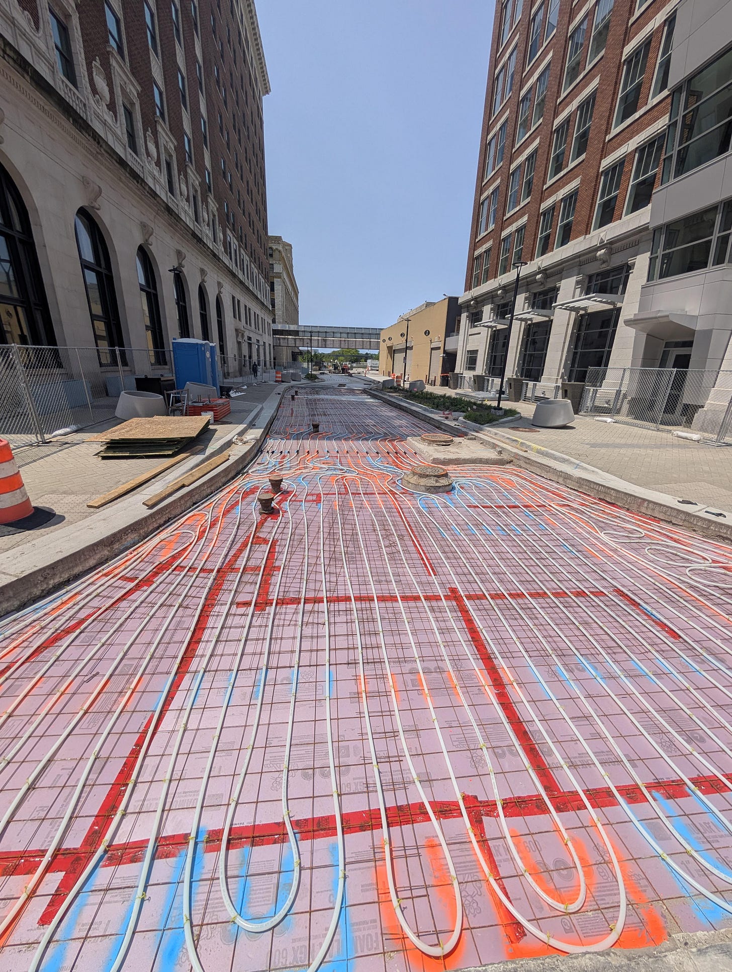 r/interestingasfuck - Heated road being installed in Grand Rapids, Michigan