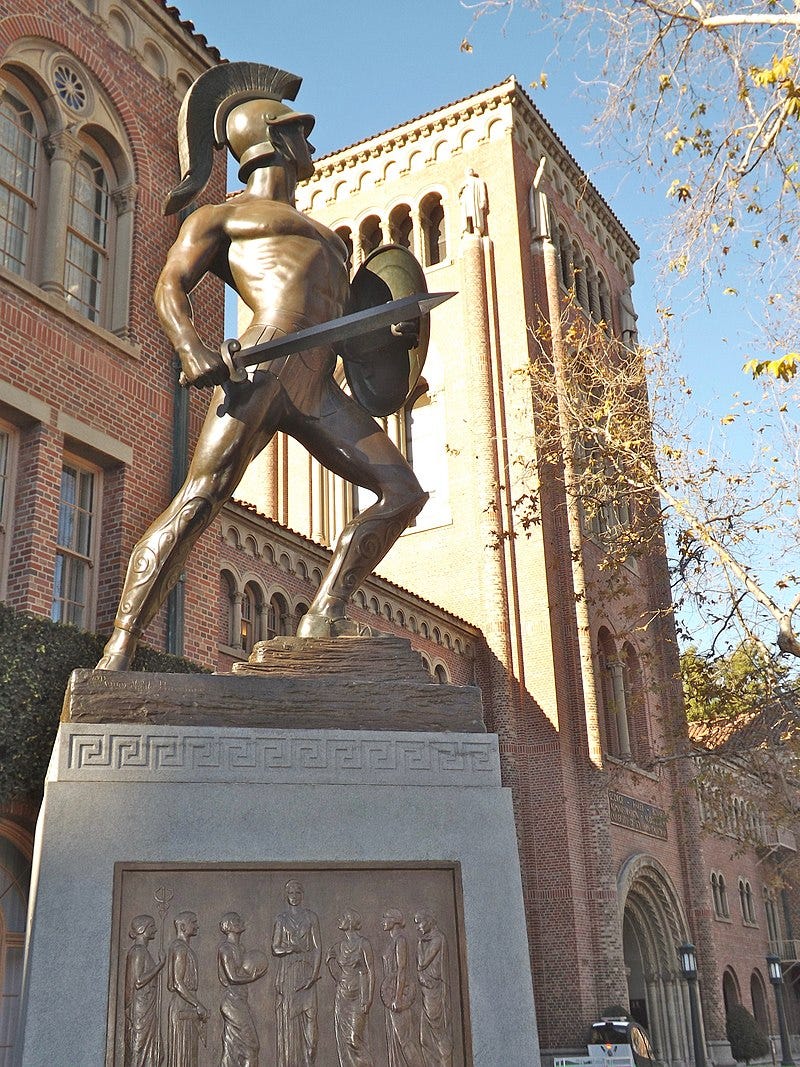 Tommy Trojan statue at University of Southern California with building in background, 2013.jpeg