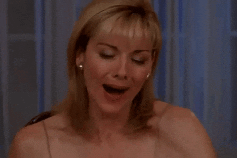 Samantha Jones, personaggio della serie TV "Sex and the City", esprime entusiasmo ed eccitazione durante una scena iconica, con un sorriso e gestualità vivace, simbolo del suo spirito libero e della comicità della serie. Samantha Jones, personaggio della serie TV "Sex and the City", esprime entusiasmo ed eccitazione durante una scena iconica, con un sorriso e gestualità vivace, simbolo del suo spirito libero e della comicità della serie.