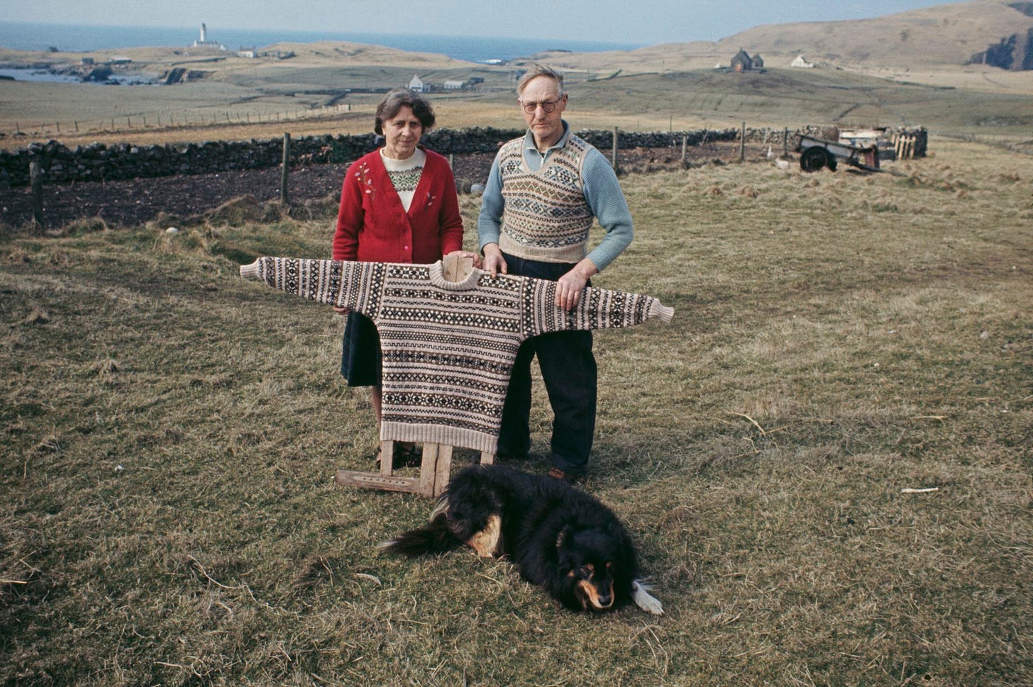 A couple with a traditional Fair Isle pattern sweater on a board, Fair Isle, Shetland Islands, Scotland, June 1970. (Photo by Chris Morphet/Redferns)