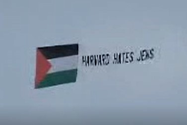 A plane carrying the Palestinian flag and an aerial banner with the words "Harvard Hates Jews" was circling the Cambridge campus on Thursday. ("Harvard with Hamas" photo)