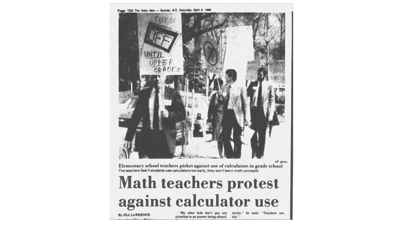 A newspaper clipping with a photo of teachers holding pickets denouncing calculator use.