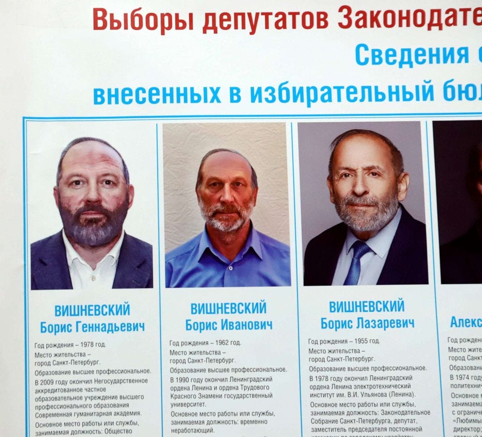 PHOTO: A candidate from the Yabloko party named Boris Vishnevsky, right, who is running to retain his seat in the St. Petersburgs legislative assembly, appears on a poster in the city.