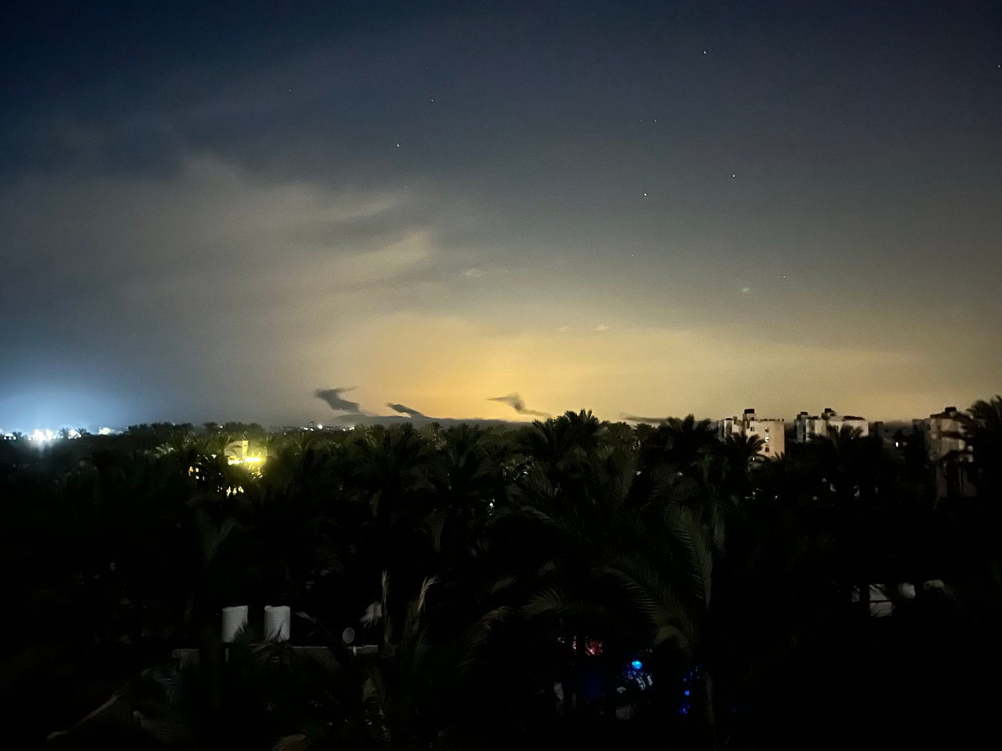 Plumes of smoke from central Gaza just as Israel began its heavy bombing