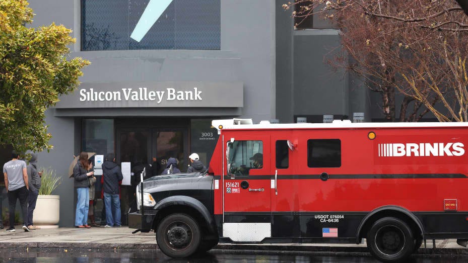 SANTA CLARA, CALIFORNIA - MARCH 10: A Brinks armored truck sits parked in front of the shuttered Silicon Valley Bank (SVB) headquarters on March 10, 2023 in Santa Clara, California. Silicon Valley Bank was shut down on Friday morning by California regulators and was put in control of the U.S. Federal Deposit Insurance Corporation. Prior to being shut down by regulators, shares of SVB were halted Friday morning after falling more than 60% in premarket trading following a 60% declined on Thursday when the ban