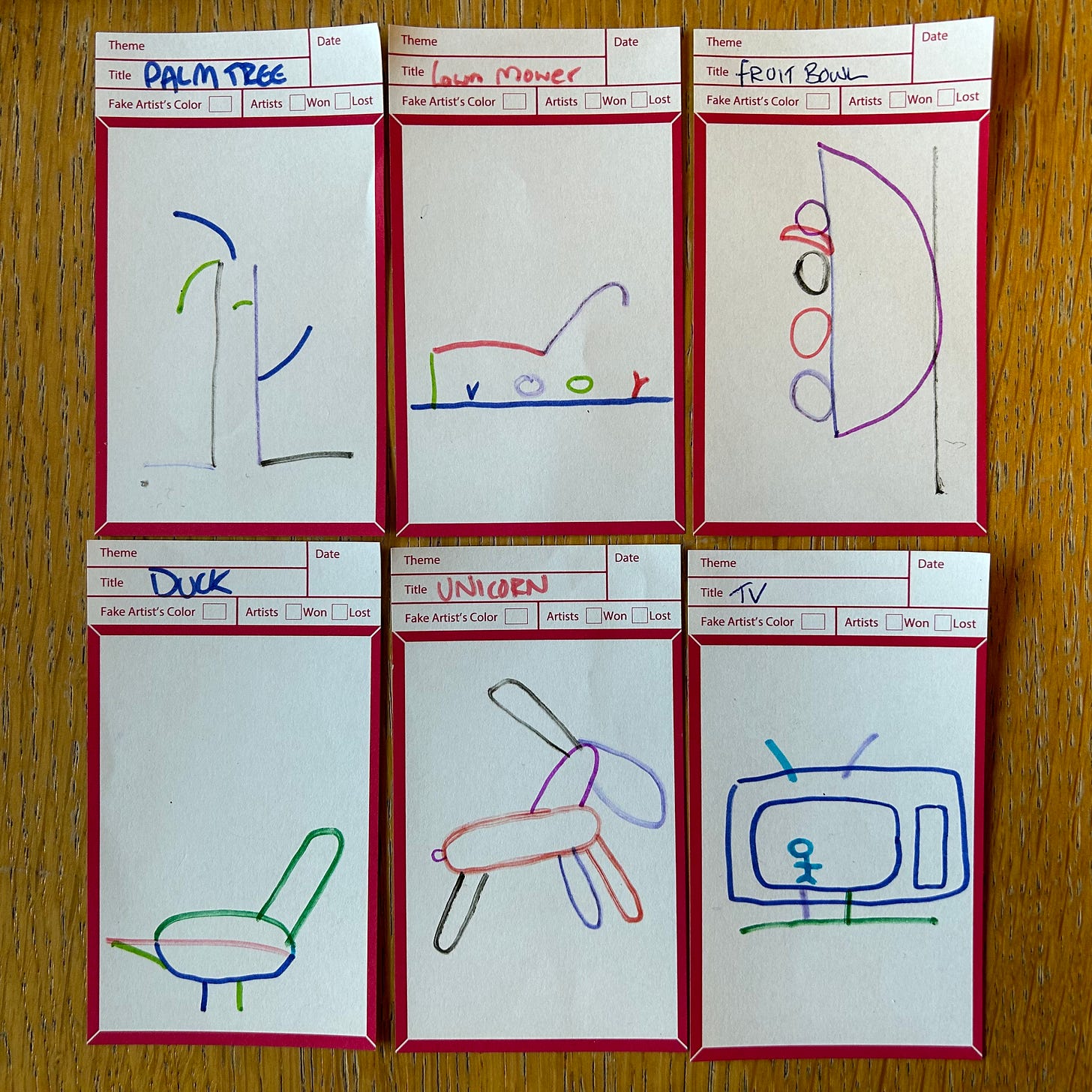 Pictures from the game. There is a palm tree. A Lawn mower. A fruit bowl (that has been drawn landscape rather than portrait). A duck (with no head). A unicorn (with it's horn on the back) and a TV.