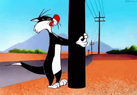 Cartoon character banging head on pole
