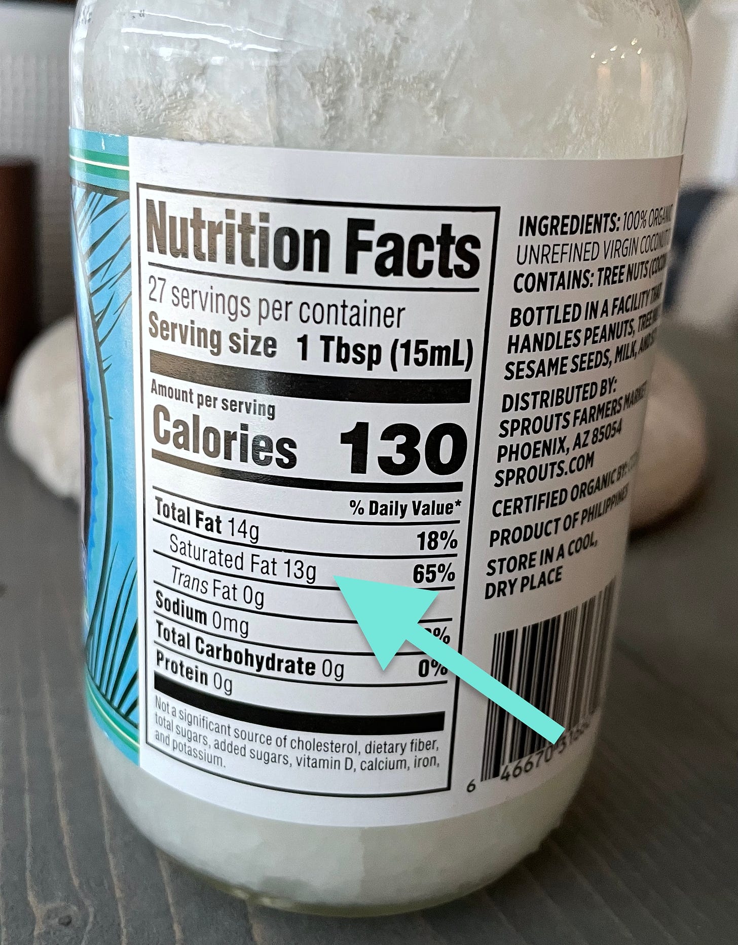 Coconut oil nutrition label highlighting 13 grams of saturated fat