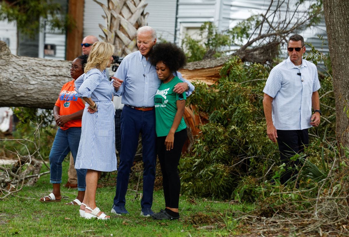 Biden surveys storm damage in Florida, without DeSantis | Reuters