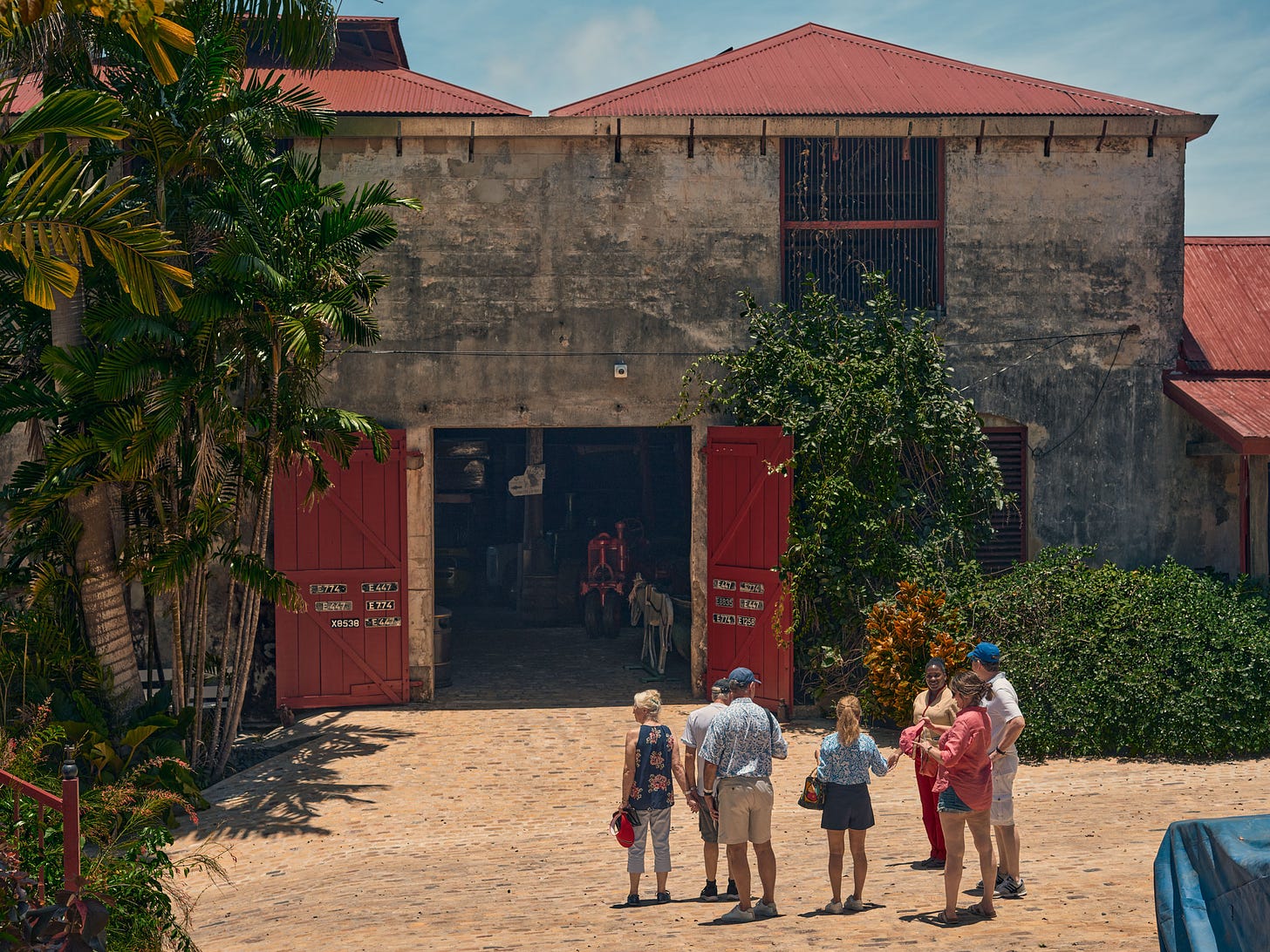 Tourists outside of the St. Nicholas Abbey and Steam Railway in Barbados. (Christopher Gregory-Rivera for TIME)