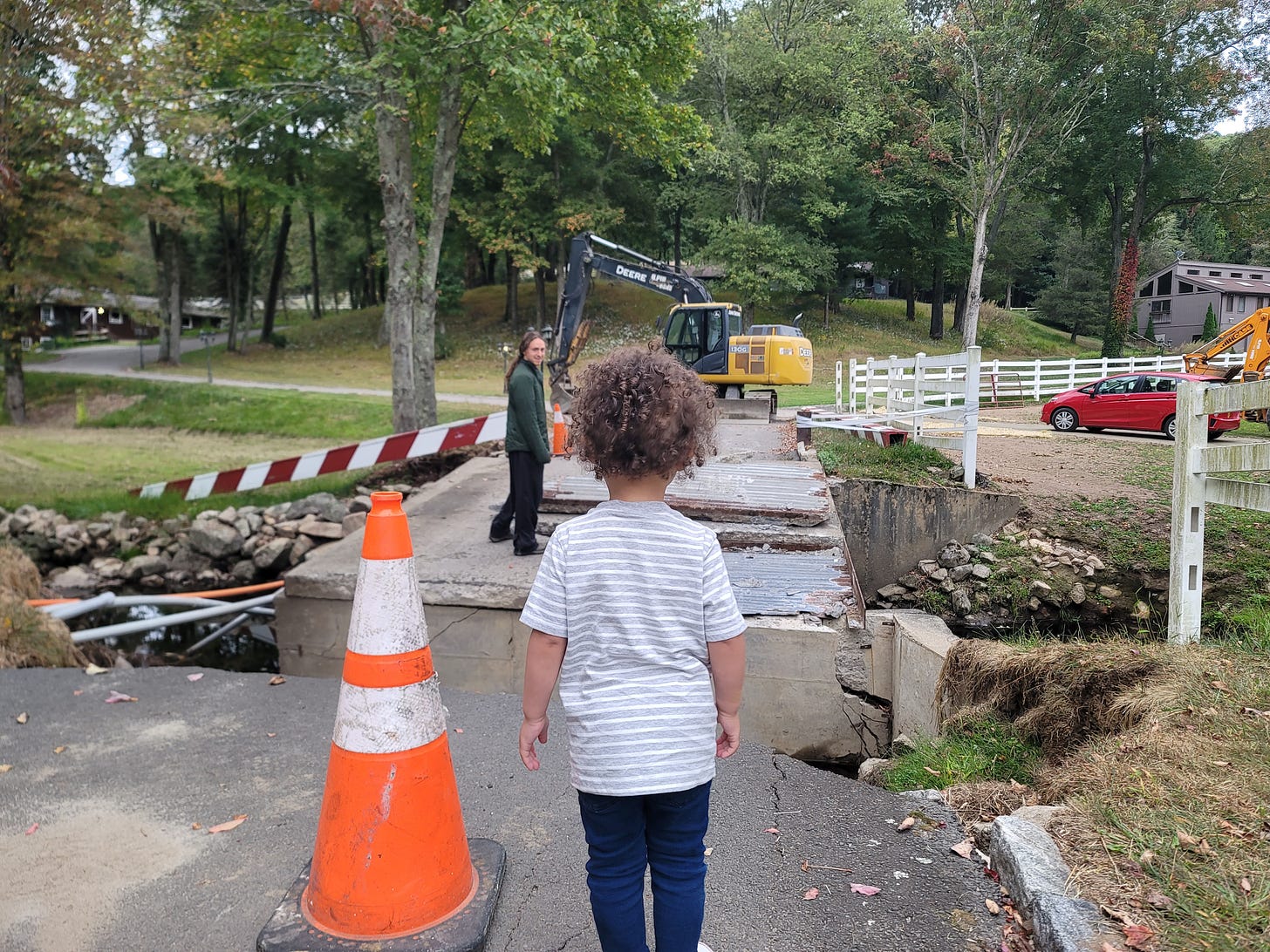 Our daughter, looking toward James on the bridge that was destroyed