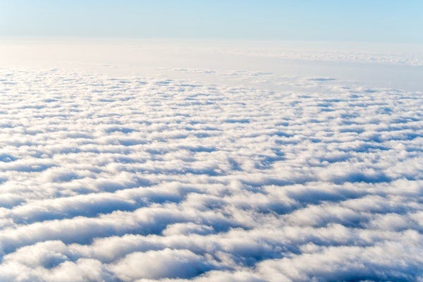 White ruffle clouds in stratosphere background.