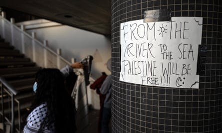 poster says ‘from the river to the sea, palestine will be free’