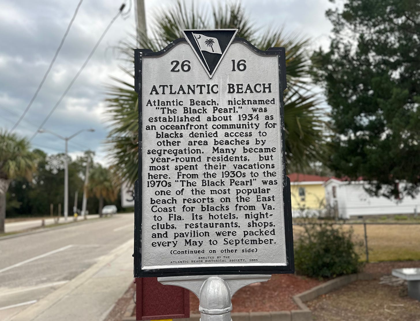 Historical marker outside Atlantic Beach Town Hall on 3rd Street near Highway 17. Author photograph, December 2023
