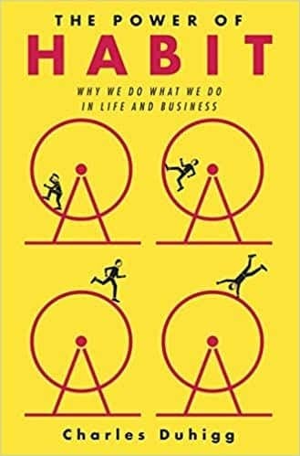 The book cover of “The Power of Habit” by Charles Duhigg. It involves 4 people running around a hamster wheel in various states