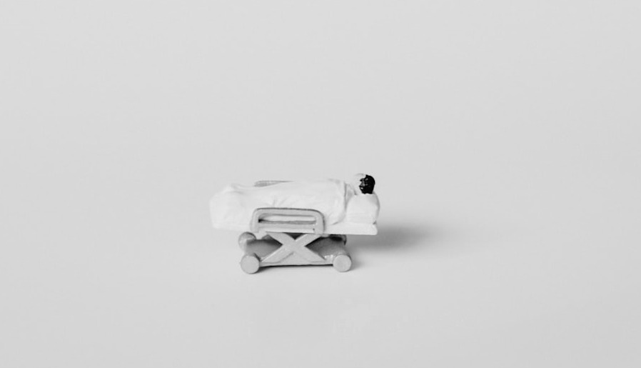 white robot toy on white surface white robot toy on white surface
