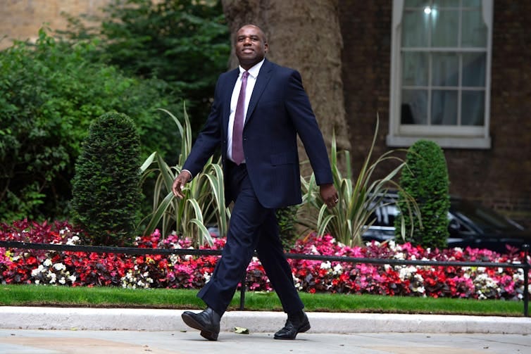 David Lammy walking.