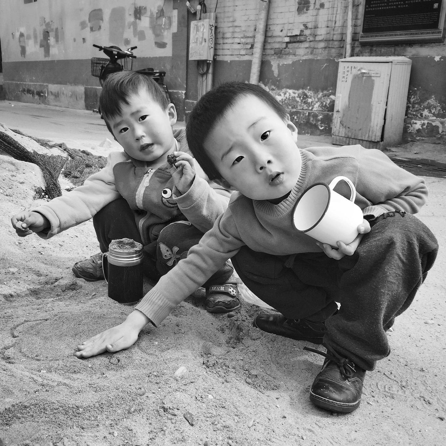 Kids playing in a hutong in Beijing.