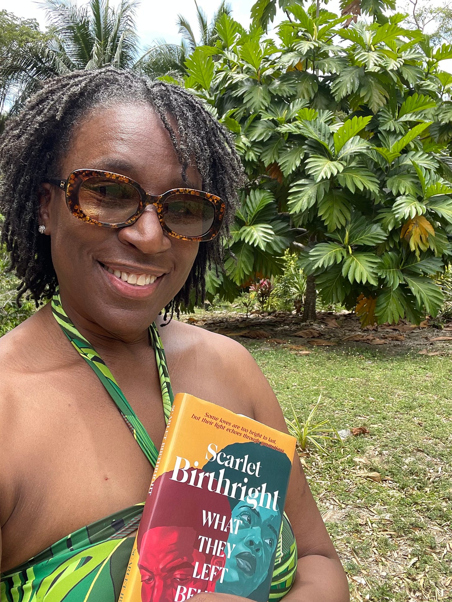 Author, Scarlet Ibis James @ The Arboretum in Trinidad, Claiming her book: Scarlet Birthright. Author, Scarlet Ibis James @ The Arboretum in Trinidad, Claiming her book: Scarlet Birthright.