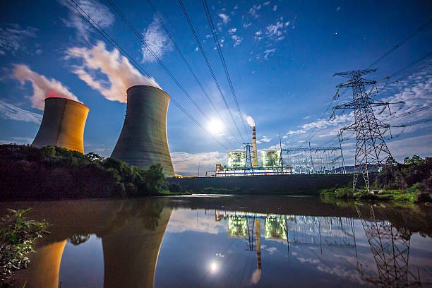 coal power plant at river - coal fired power plants stock pictures, royalty-free photos & images