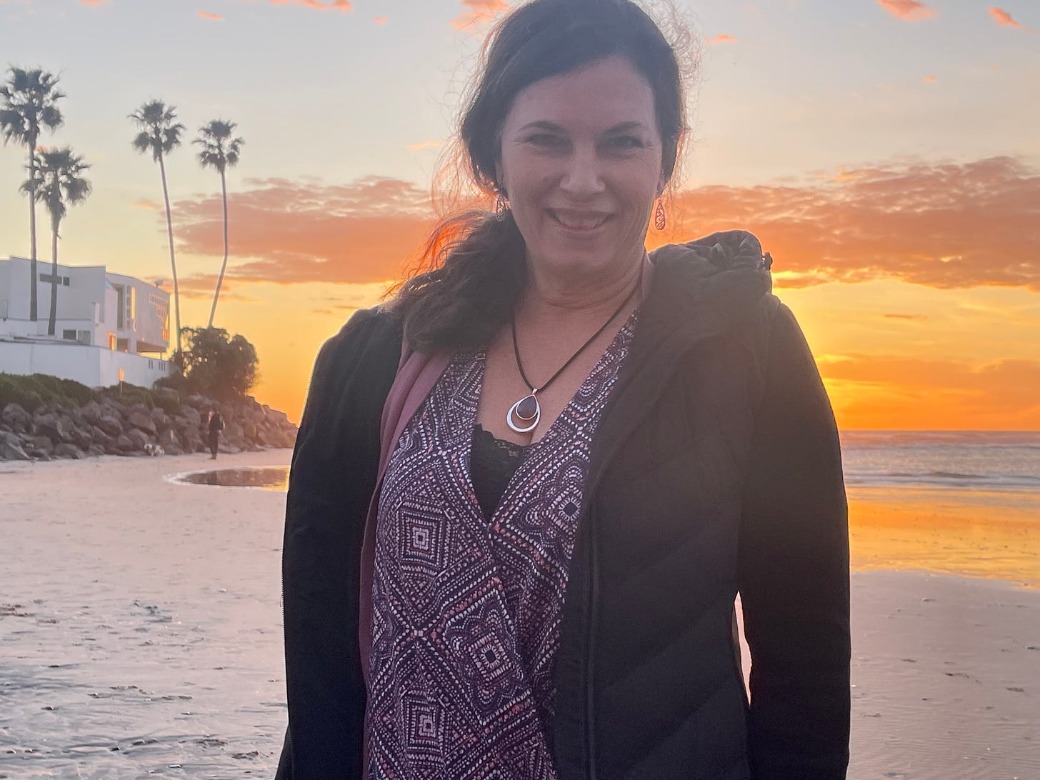 Maryann at the beach with orange sky