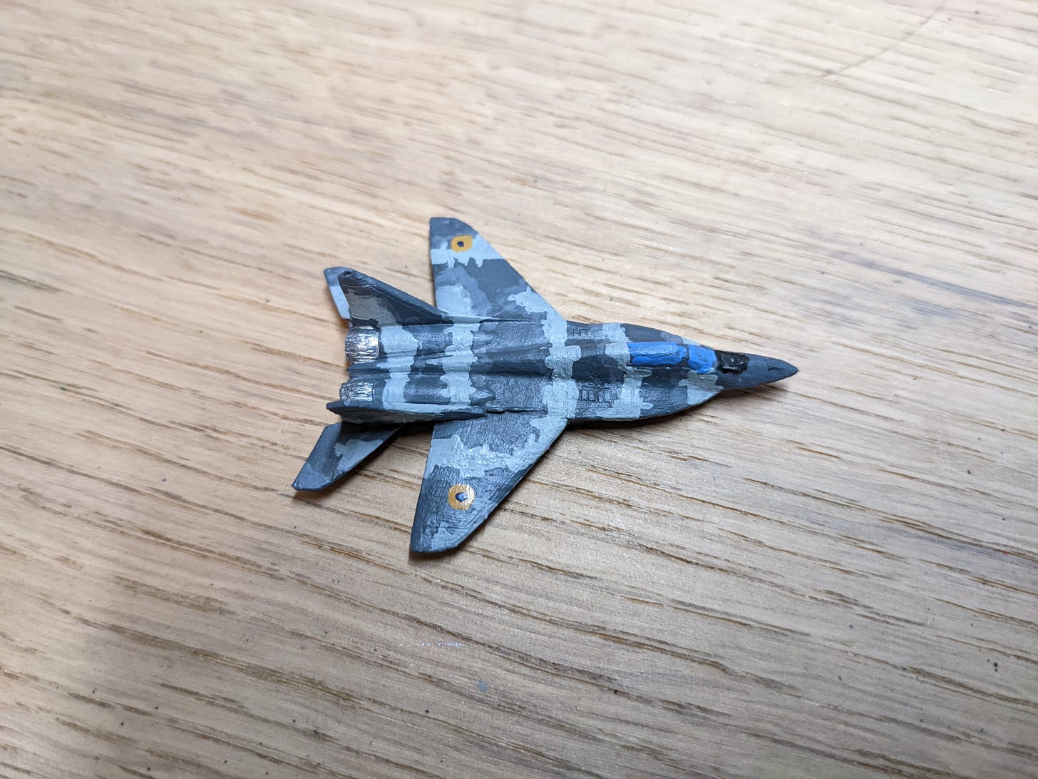 A 6 mm scale model of a Mig-29 fighter painted in the style of the 'Ghost of Kyiv' jet fighter of the Ukrainian air force