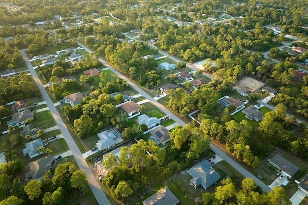 Premium Photo | Aerial view of suburban landscape with private homes ...