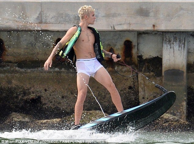 justin bieber working waves in underwera