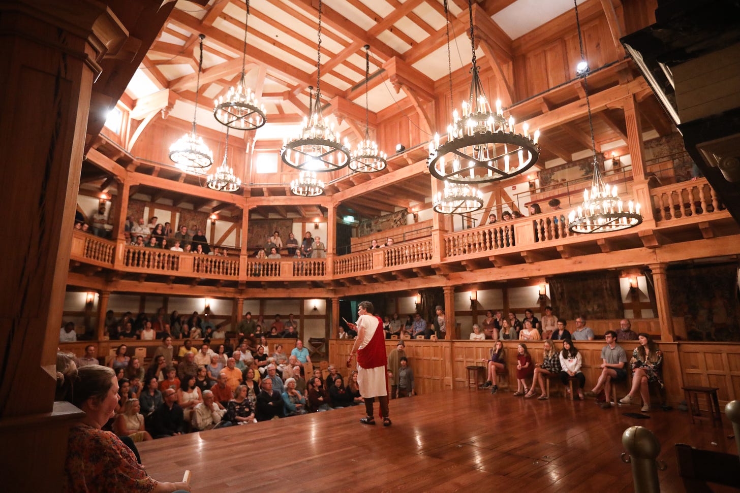 Interior of the Blackfriars Playhouse, a largely-wooden reconstructed Elizabethan indoor theatre, during a production of Julius Caesar.